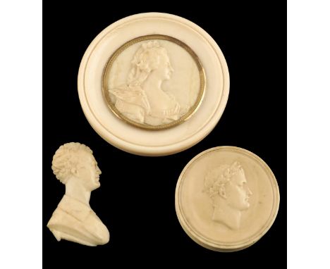 λ An early 19th century French carved ivory portrait medallion of a lady, possibly Marie Antoinette with an outer gilt mount,