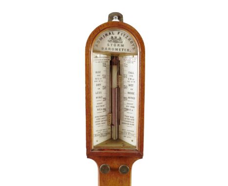 λ A Victorian oak Admiral Fitzroy storm barometer by Negretti &amp; Zambra, with twin ceramic dials inscribed 'NEGRETTI &amp;