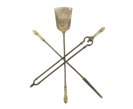 A set of three early 19th century steel fire tools, each with a foliate decorated gilt bronze handle and faceted stem, with a