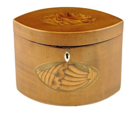 λ A George III harewood and marquetry navette shape tea caddy, inlaid with conch shells, with an ivory escutcheon and with a 