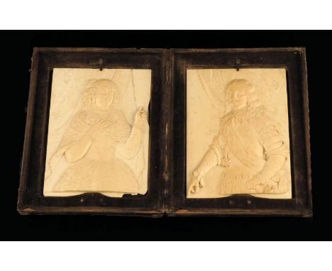 λ A pair of 19th century French Dieppe craved ivory portrait plaques, of Louis XIII and Anne of Austria, 16 x 11.6cm, mounted