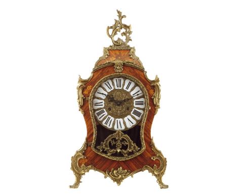 A kingwood and marquetry mantel clock in Louis XV style, with a German eight day movement, the gilt brass and white enamel di