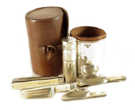 Campaign interest. A Victorian cutlery set by Mappin, with a silver plated beaker containing folding ivory handled knife, spo