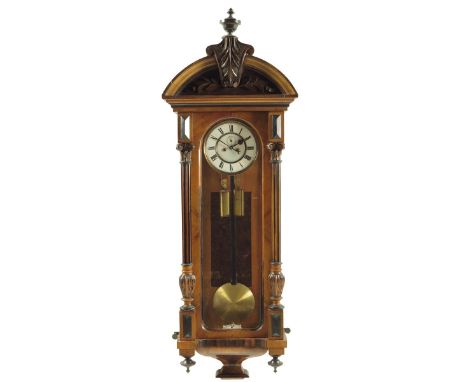 A late 19th century Vienna regulator wall clock, the eight day movement striking on a gong, the backplate stamped '1000000 59