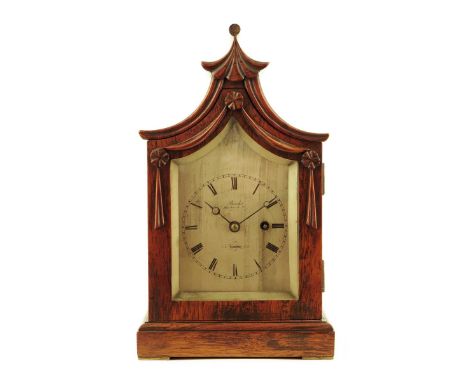 λ An early 19th century rosewood mantel clock, the eight day single fusee movement with an anchor escapement, the silvered di