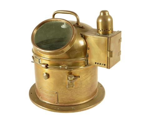 A brass ship's binnacle compass, with an applied plaque inscribed '6605-99-460-6389, 7428/SIS/R/38', 26.5cm high.