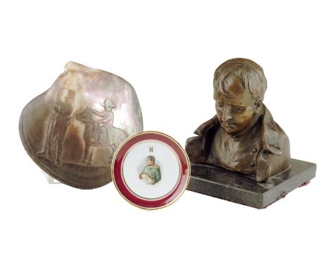 A bronze bust of Napoleon, on a marble plinth, 18.2cm high, together with a South Sea Island carved mother of pearl shell dep