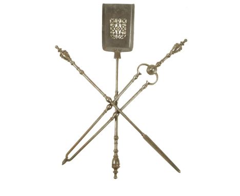 A set of 19th century steel fire tools, each with a beaded urn handle and a knopped stem, with a pierced pan, 74.6cm long (ma