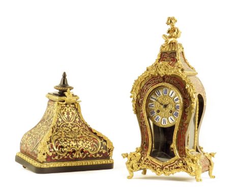 λ A late 19th century French brass and tortoiseshell boulle marquetry mantel clock, the eight day movement with an outside co