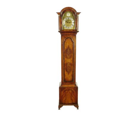 A walnut grandmother clock in 18th century style, the eight day three train movement striking on eight gongs with an engraved
