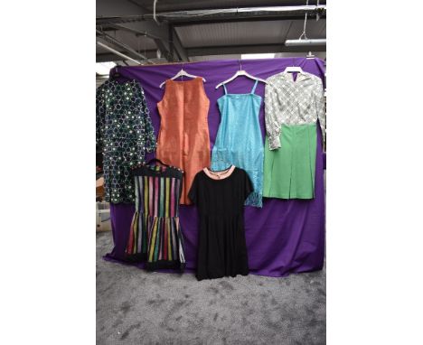 A selection of mixed vintage dresses including early 1950s grosgrain dress and patterned 60s dresses.AF