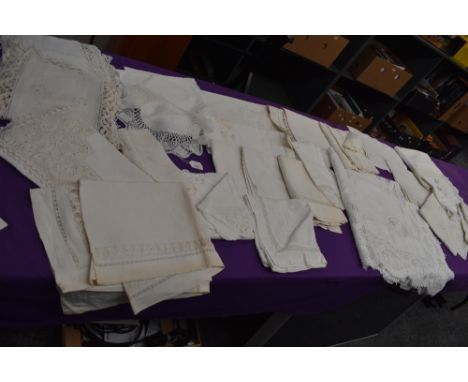 A good amount of vintage and antique table linen, some embroidered items and others with crotchet edging and similar.