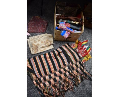 A mixed box of vintage,antique and retro ethnic and oriental clothing and textiles also included is a fringed shawl.
fabric i