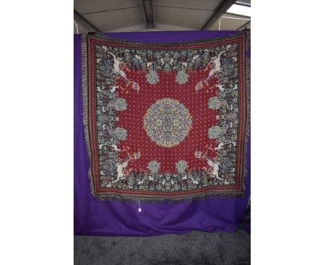 A Metrax-crape Flemish tapestry wool hanging or throw having floral and animal pattern on red ground.