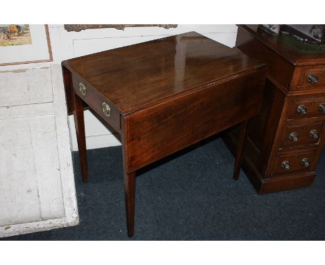 A 19th century Pembroke mahogany table with two drop flaps, drawer and opposing dummy drawer, with brass ring handles and oct