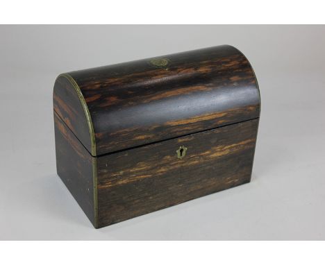 A Victorian Coromandel wood brass bound tea caddy by Parkin &amp; Gotto, with domed lid, the interior with maker's plaque, pr