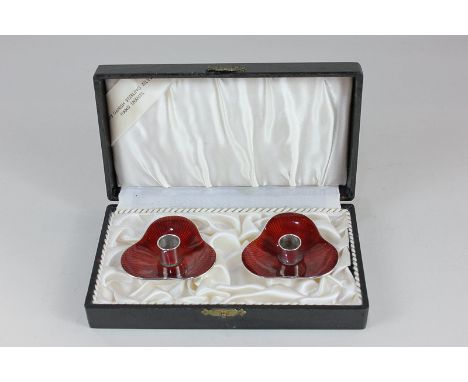 A pair of Danish silver and red enamel taper sticks / candle holders by Meka, marked 925S Meka Sterling Denmark 2cm high boxe