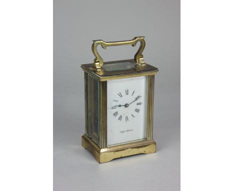 A gilt brass and bevelled glass cased carriage clock, the dial marked Mappin &amp; Webb Ltd, 14.5cm high