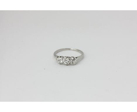 A diamond old cut diamond three-stone ring
