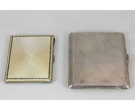 A George VI silver and yellow guilloche enamel cigarette case, maker Adie Brothers, London 1938, and another silver cigarette