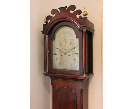 A George III flame mahogany longcase clock, the domed 12 inch dial with secondary dial and date aperture, with eight day move