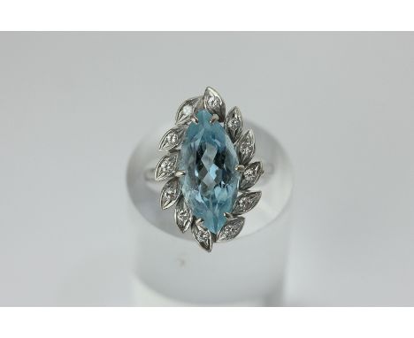An aquamarine and diamond cluster ring