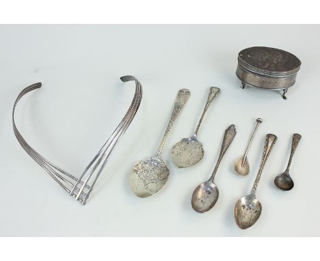 A Victorian silver trinket box, marks worn, two caddy spoons, two teaspoons, two condiment spoons, and a white metal torc nec