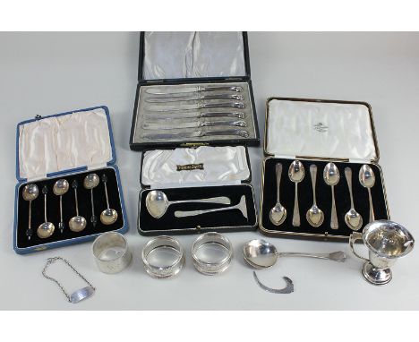 A cased set of six George V silver teaspoons, makers Docker &amp; Burn Ltd, Birmingham 1929, together with a cased set of six