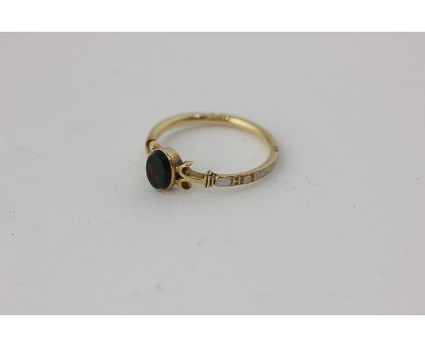 A 19th century gold, enamel and bloodstone ring, the shoulders enamelled with the words Courage and March