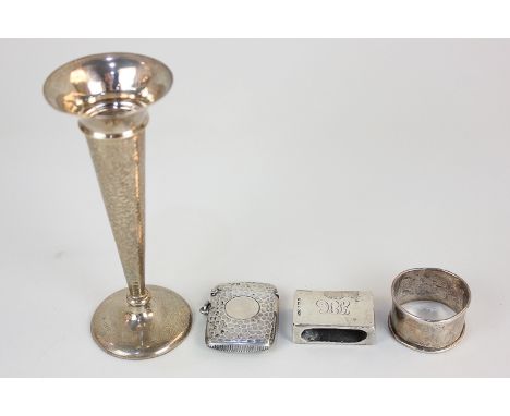 An Edward VII silver vesta case, maker John Millward Banks, Chester 1904, together with a silver bud vase, matchbox cover and