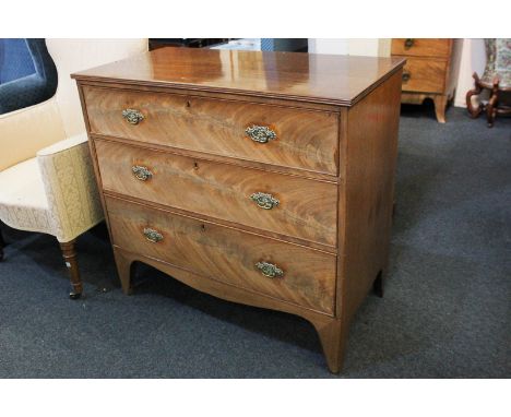 A flame mahogany chest of three drawers, on bracket feet, 88cm