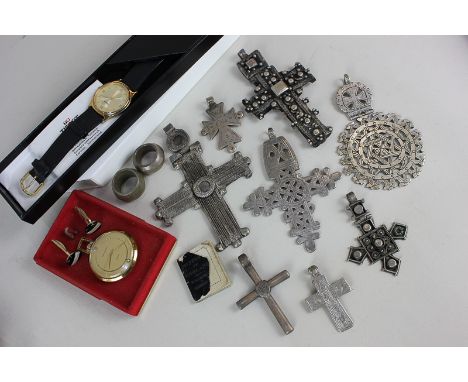 A collection of Ethiopian and other pectoral crosses, two rings, cufflinks, a Tissot watch, and a Wittnauer pocket watch