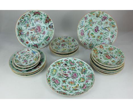 A collection of Chinese porcelain plates decorated with birds, butterflies and flowers on celadon ground, comprising three la