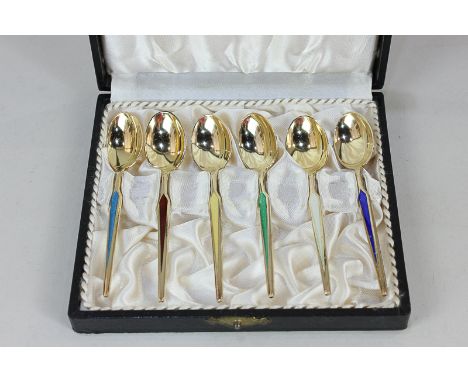 A cased set of six Danish silver gilt and harlequin enamel coffee spoons by Meka, marked sterling Meka Denmark (one a/f)