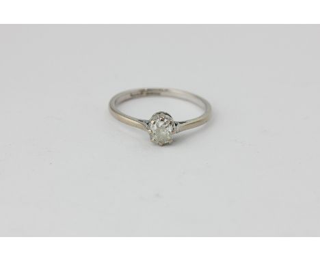 A diamond single stone ring, the oval cut stone eight-claw set in 18ct white gold