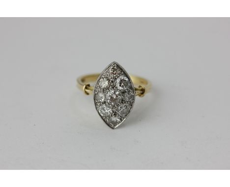 A diamond cluster ring, the nine stones pave set in 18ct gold