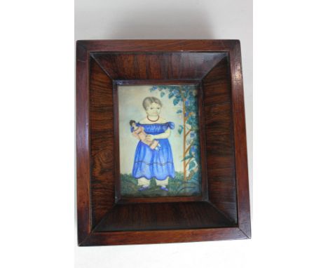 A 19th / early 20th century miniature portrait of a young girl wearing a red necklace and blue dress, holding a doll, waterco