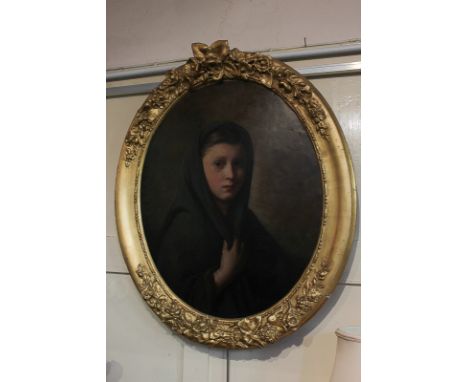 Circle of James Sant, portrait of a girl in green shawl, oil on board, in oval gilt frame, 64cm by 51.5cm