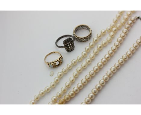 An opal and diamond ring (stone loose), a 9ct gold full hoop ring, a marcasite ring, and an imitation pearl necklace