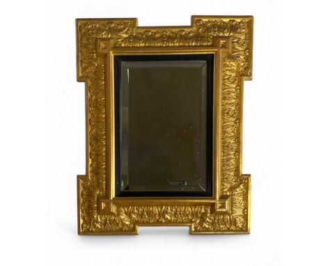 A small late 19th century Louis XIV style giltwood and gesso mirror
The rectangular bevelled plate within a reeded slip and r