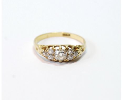 Diamond ring with old-cut brilliant, approximately .5ct, flanked by six others, smaller, in gold, '18ct', size R. Condition R