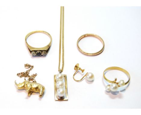9ct gold band ring, a similar gem ring and four other items.