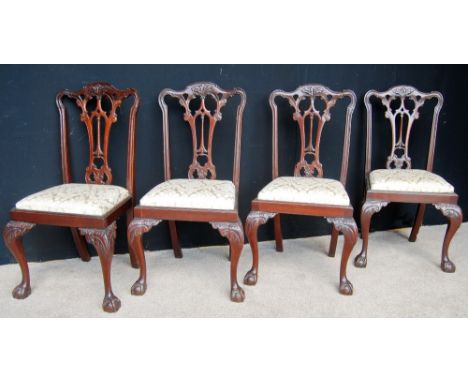 Set of four Edwardian Chippendale style chairs.