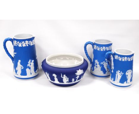 Dudson Pottery dark blue Jasper ware 'Sacrifices' pattern circular bowl, 22cm diameter, and a graduated set of three 'Muses a