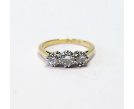 Diamond three-stone ring with brilliants, approximately .25ct and .50ct, '18ct plat', size L½. Condition Report Clean.  Colou