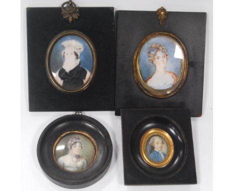 Four portrait miniatures depicting a Georgian boy in blue jacket and ruff, lady in a bonnet with pink ribbon and another two 