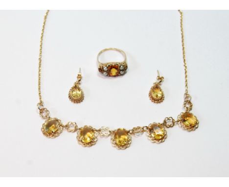 9ct gold necklet with five citrines, a pair of matching earrings and a similar ring with pearls, 15.9g gross.