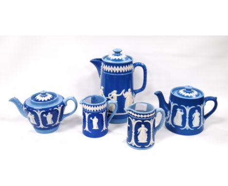 Dudson Pottery 'Two Blues' 'Figures and Divisions' pattern Jasper ware teapot, a pottery teapot and two jugs, also a 'Dancing