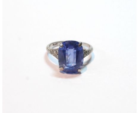 Ceylon sapphire dress ring, approximately 8ct (13mm x 10mm) of bowed, rectangular shape with diamond-set shoulders, 'plat'. C