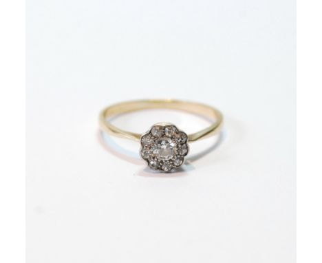 Diamond cluster ring in gold and platinum, size R.